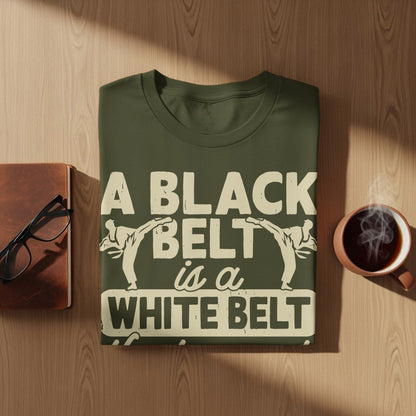Dark green t-shirt with white text and karate graphics.