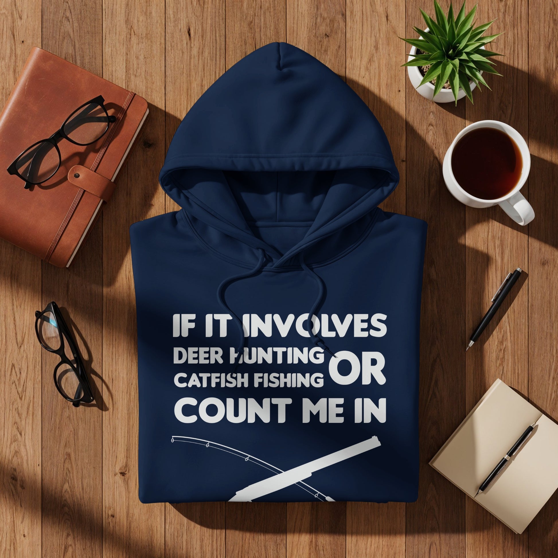 Navy hoodie with "If it involves deer hunting or catfishing count me in" text.