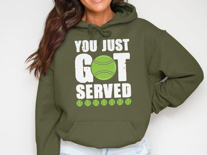 Olive green hoodie with "YOU JUST GOT SERVED" text and tennis ball graphic.