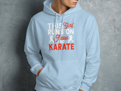 Light blue hoodie with "This Girl Runs on Jesus and Karate" text.
