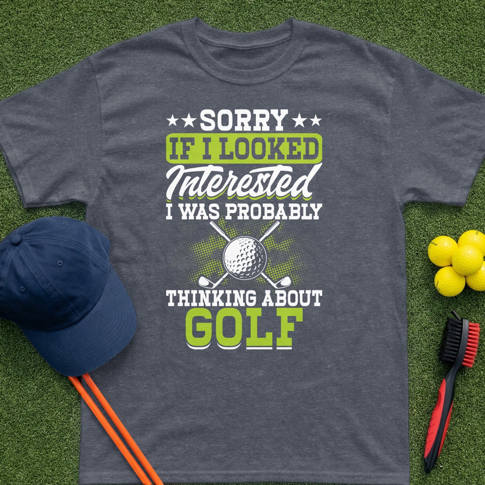 T-shirt with "Sorry If I Looked Interested, I Was Probably Thinking About Golf" text.