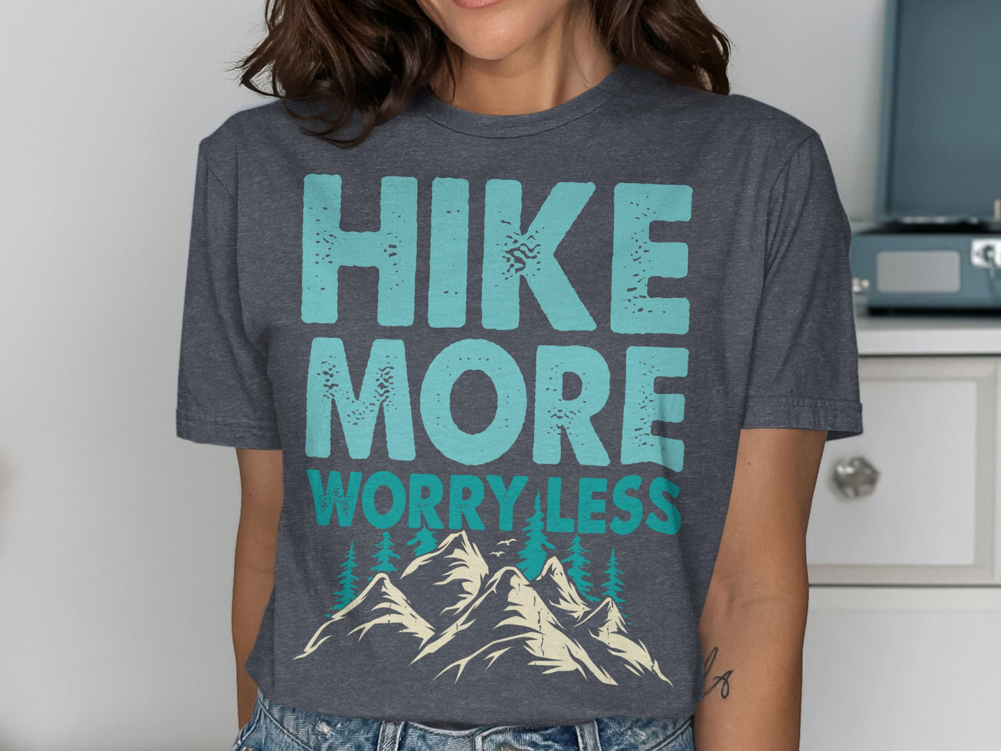 Dark grey t-shirt with "HIKE MORE WORRY LESS" and mountain graphics.