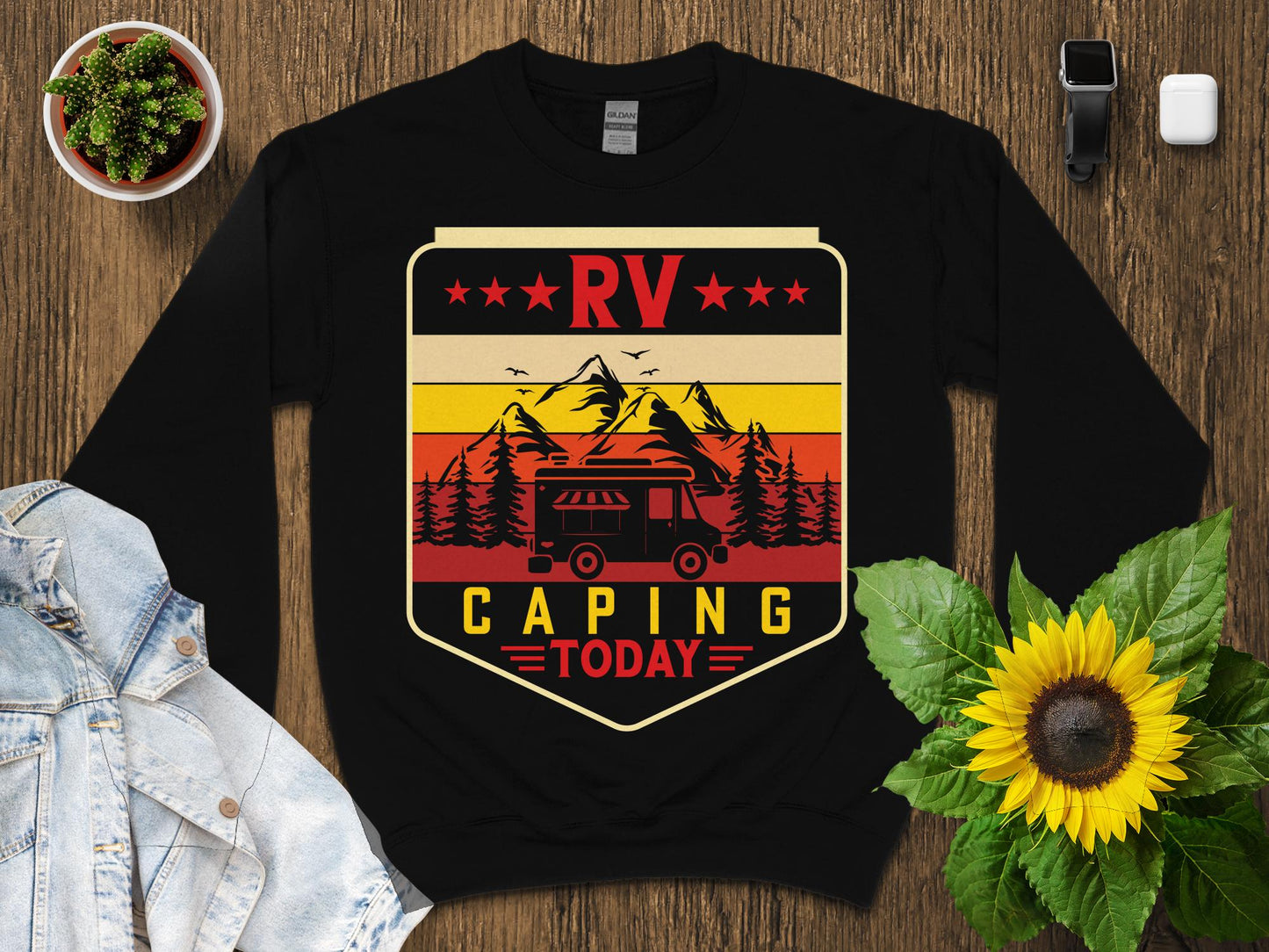 Black sweatshirt with vintage camper, mountains, and "RV Camping Today" text.