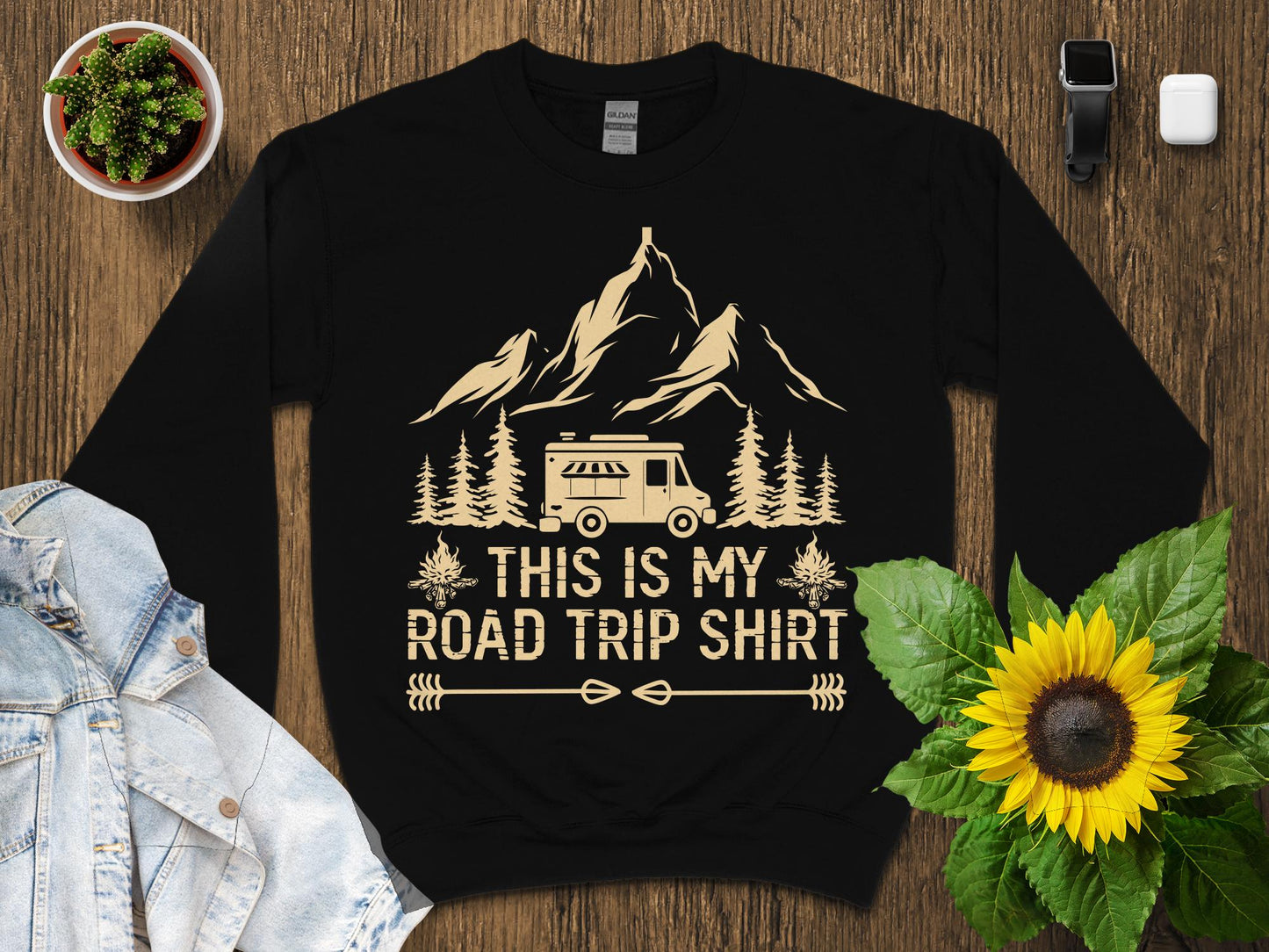 Black t-shirt with "This is my road trip shirt" and a camper van design.
