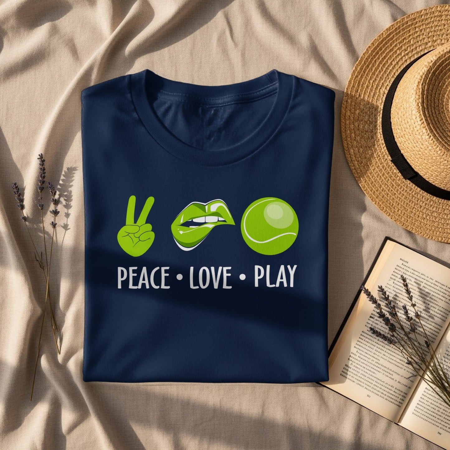 Navy t-shirt with peace sign, lips, and tennis ball graphic, "Peace. Love. Play."