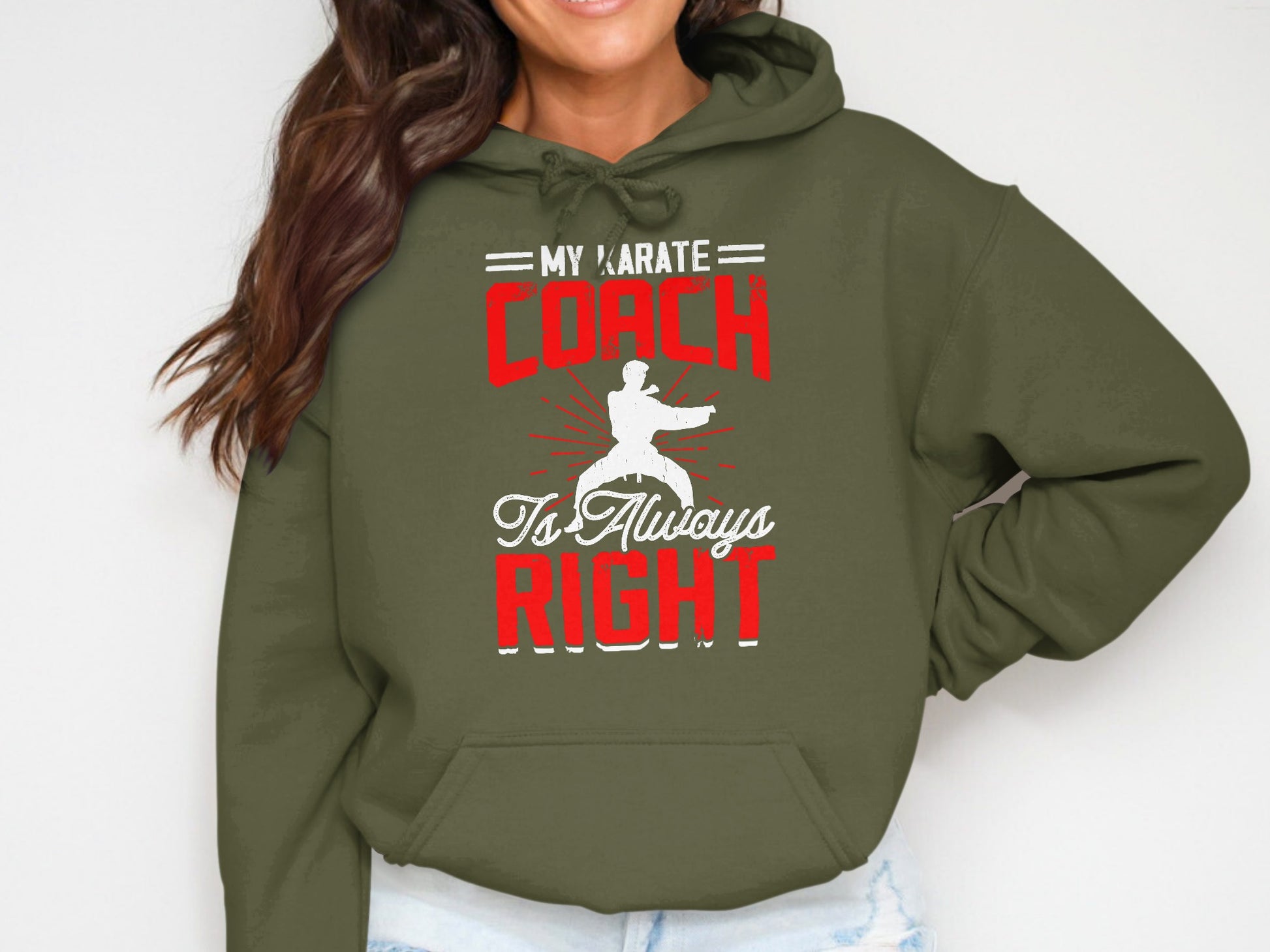Green hoodie with "My Karate Coach is Always Right" text and graphic.