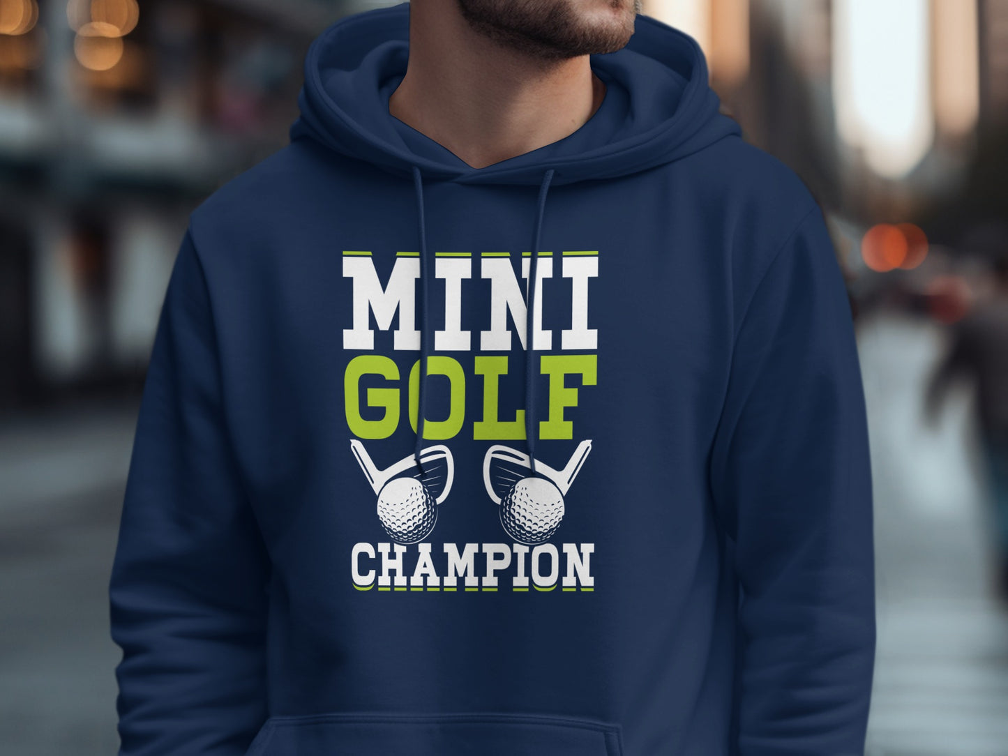 Navy hoodie with "MINI GOLF CHAMPION" text and golf balls.