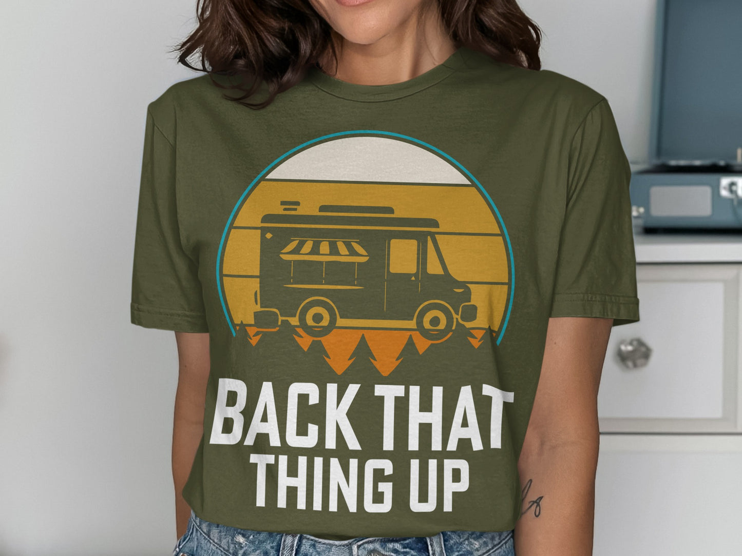 Olive t-shirt with a stylized food truck and "BACK THAT THING UP" text.