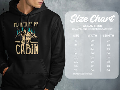 Hooded sweatshirt with "I'd Rather Be At My Cabin" graphic and size chart.