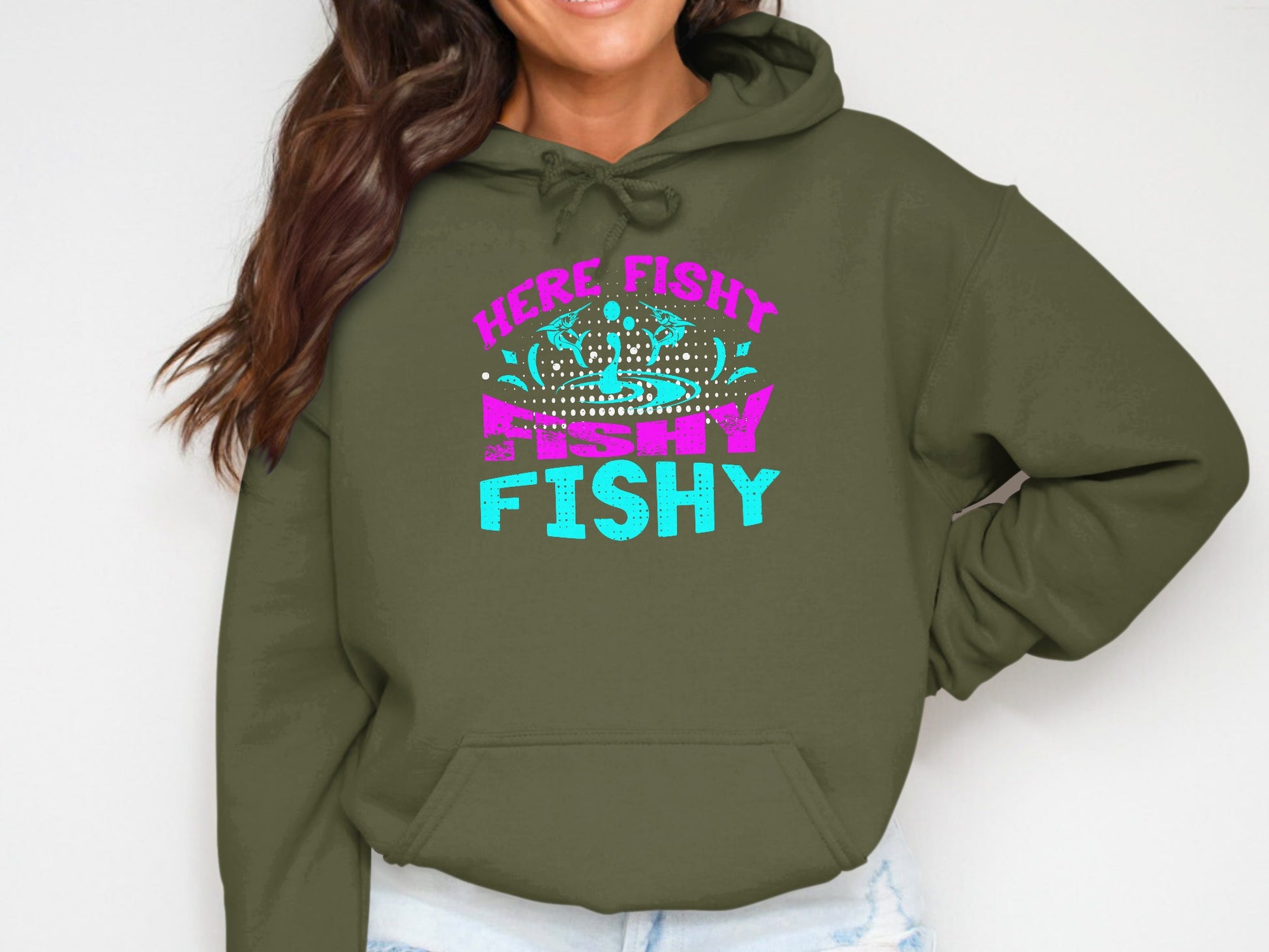 Olive green hoodie with pink and blue "Here Fishy Fishy" text.