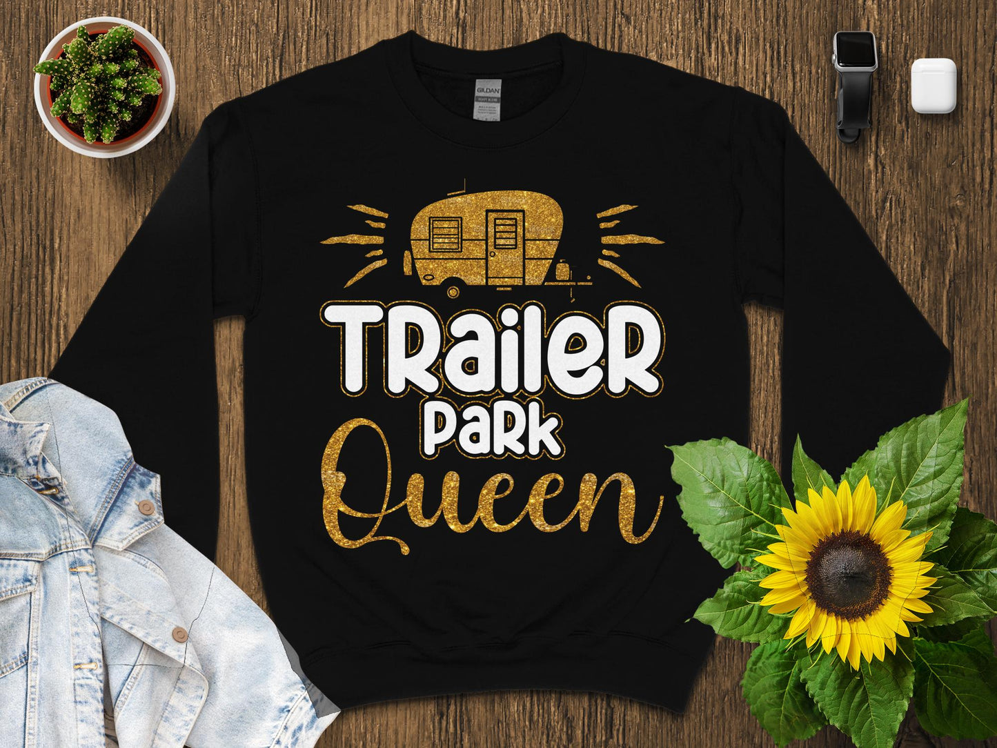Black sweatshirt with "Trailer Park Queen" in gold glitter.