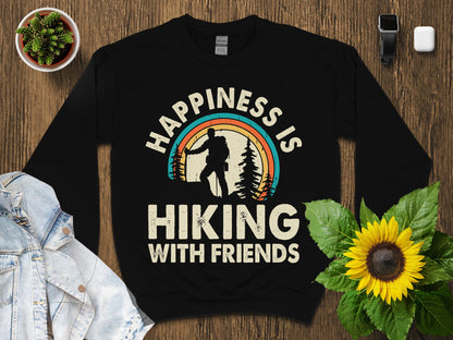 Black sweatshirt with "Happiness is hiking with friends" in retro distressed font.