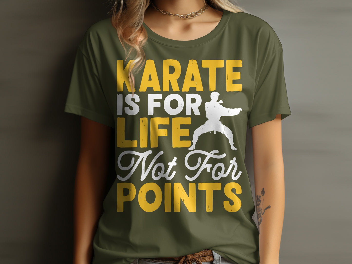 Olive green t-shirt with white text "KARATE IS LIFE Not For Points" and martial artist silhouette.