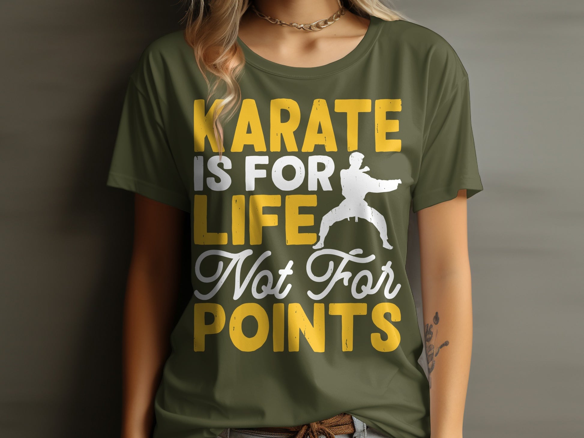 Olive green t-shirt with white text "KARATE IS LIFE Not For Points" and martial artist silhouette.