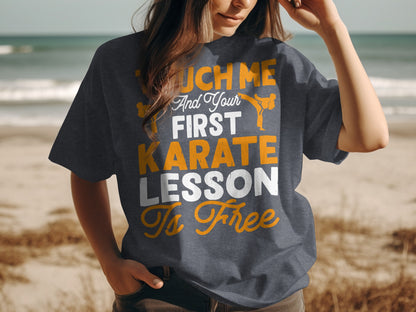 Dark t-shirt with "Touch Me And Your First Karate Lesson Is Free" text.