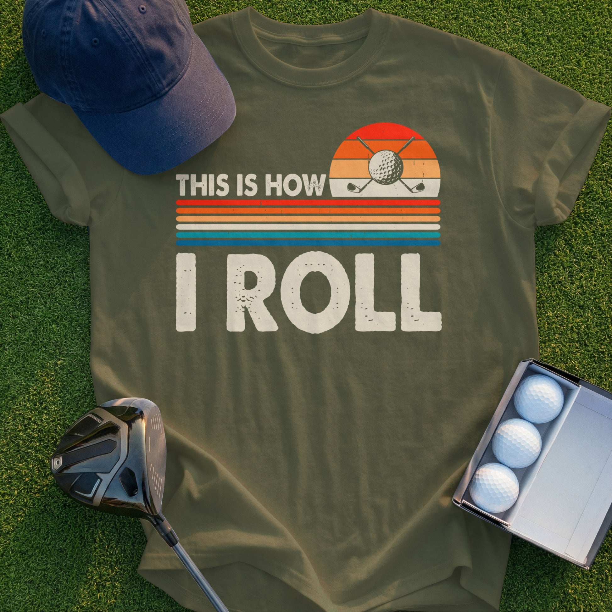 Olive green t-shirt with "THIS IS HOW I ROLL" and golf club graphic.