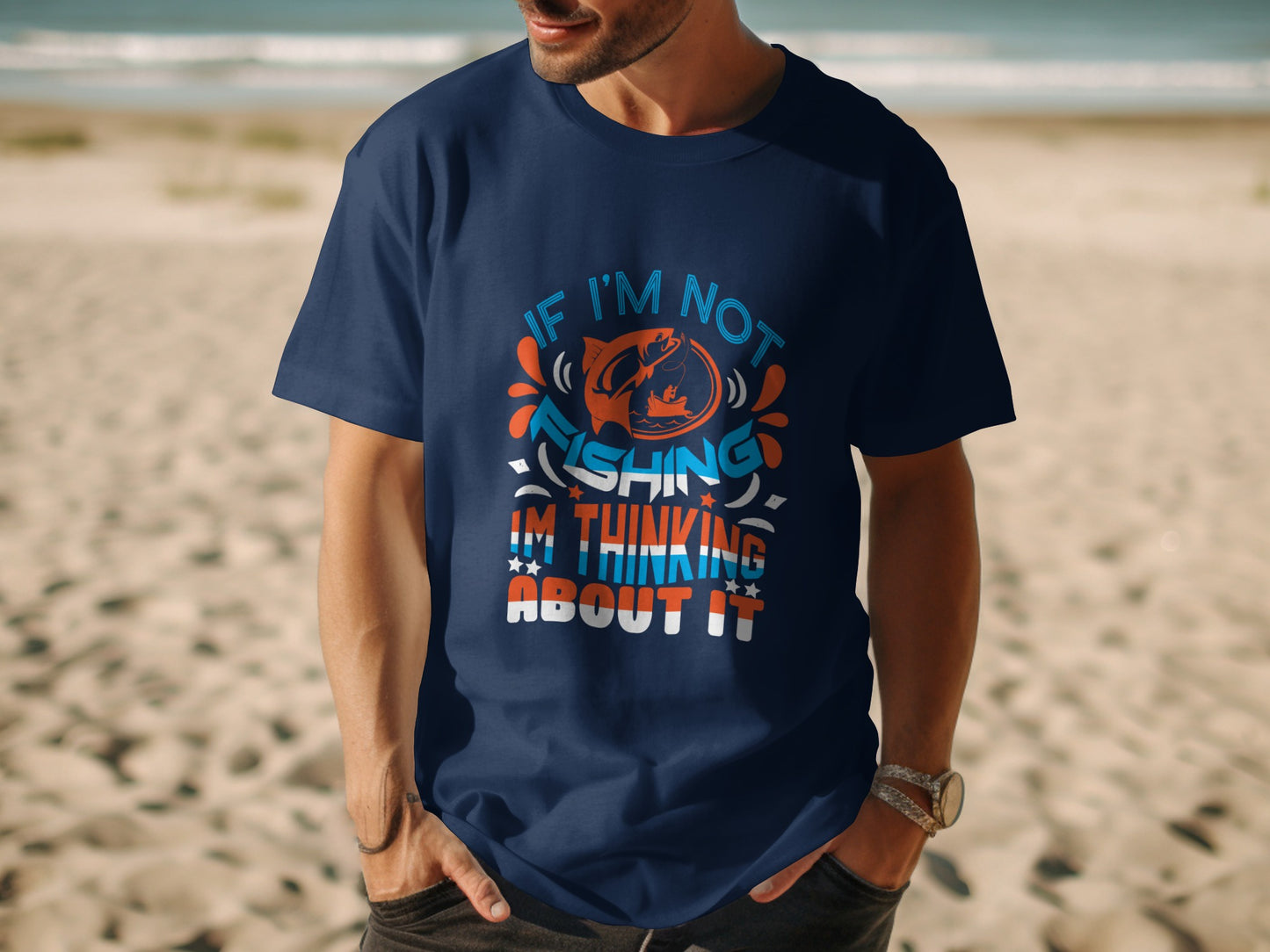 Navy t-shirt with "If I'm not fishing I'm thinking about it" text and fish graphic.