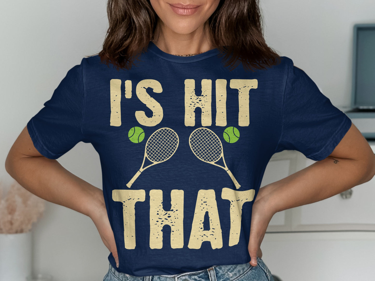Navy t-shirt with "I'S HIT THAT" text and tennis rackets and balls.