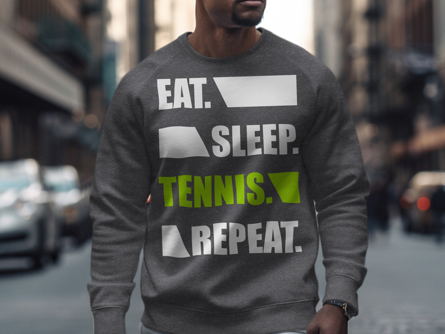 Gray sweatshirt with "EAT. SLEEP. TENNIS. REPEAT." text.