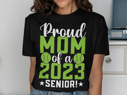 Black t-shirt with "Proud MOM of a 2023 SENIOR!" and tennis balls.