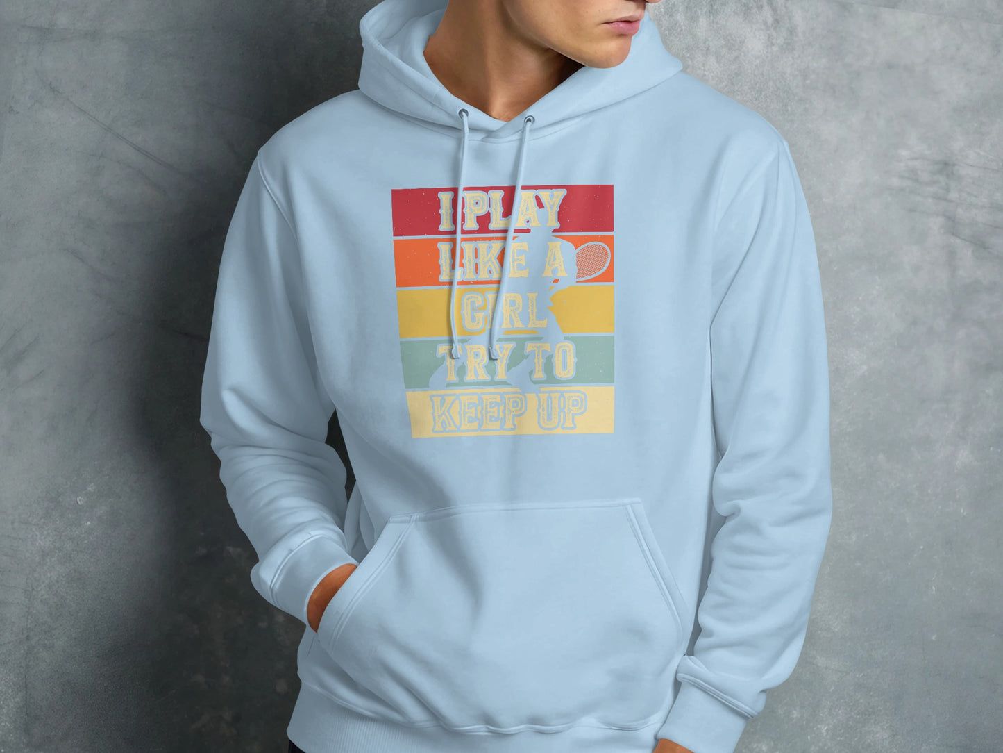 Light blue hoodie with "I Play Like A Girl Try To Keep Up" text and tennis player graphic.