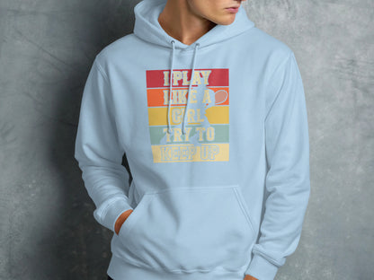 Light blue hoodie with "I Play Like A Girl Try To Keep Up" text and tennis player graphic.