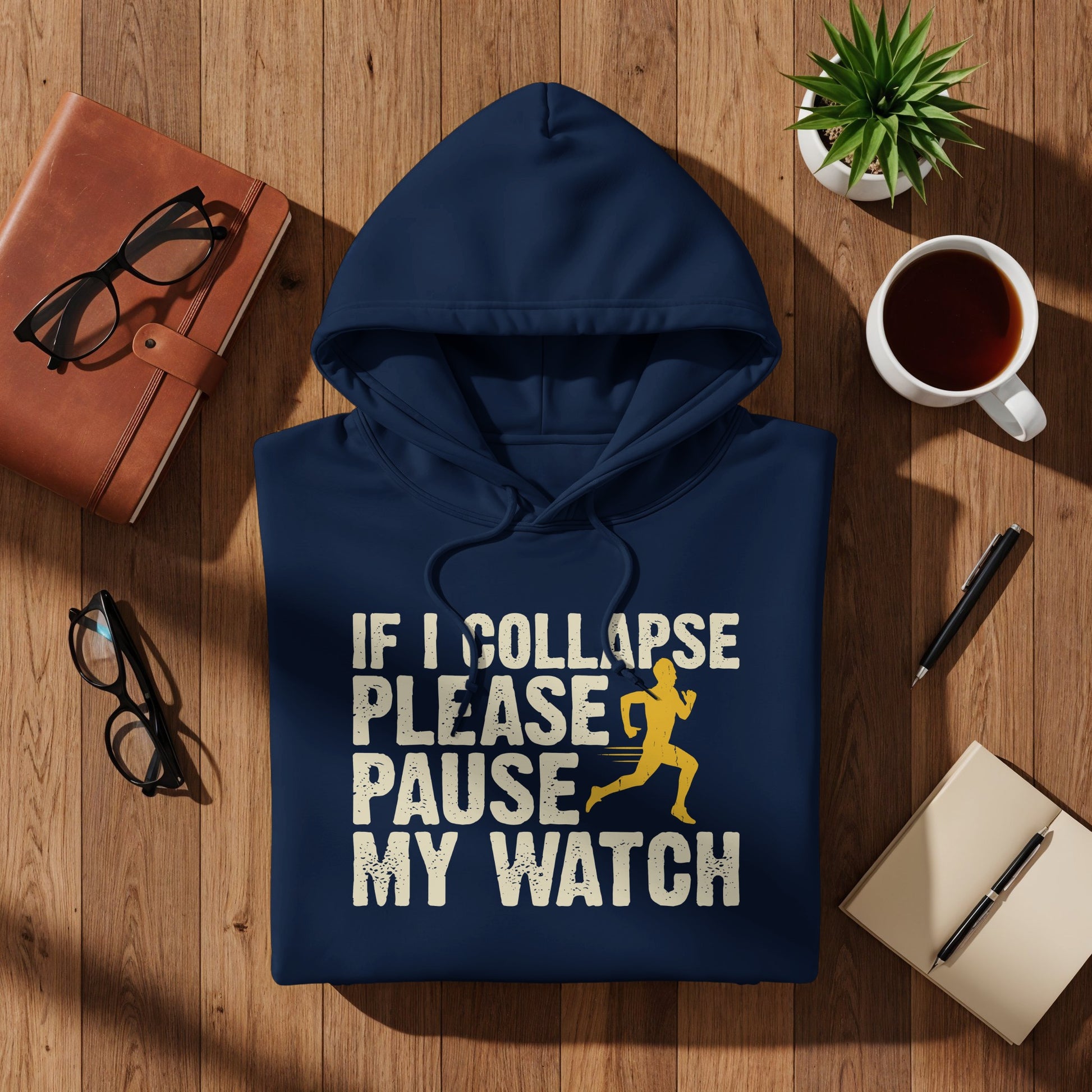 Navy blue hoodie with "If I Collapse Please Pause My Watch" text and runner graphic.