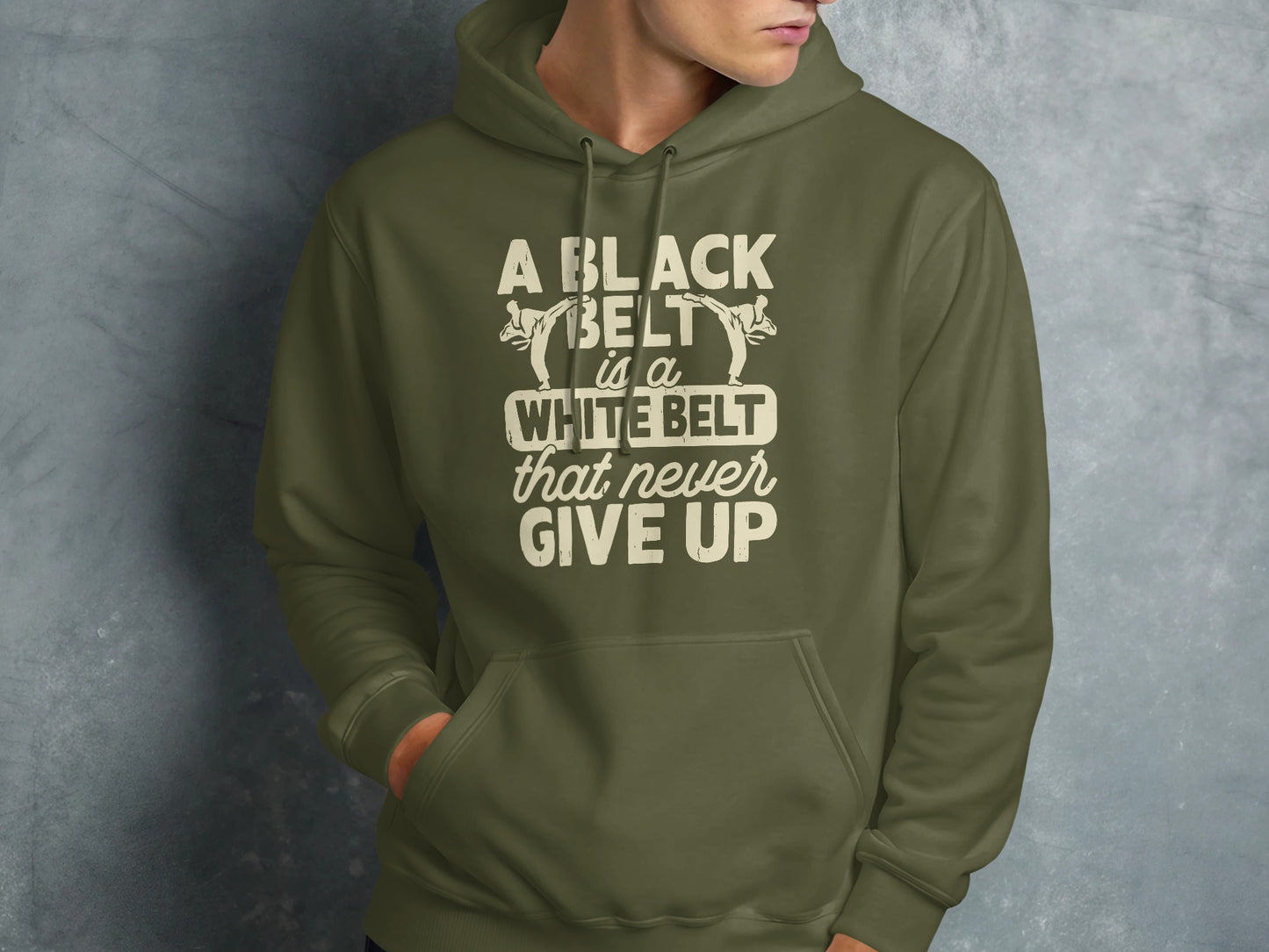 Green hoodie with "A Black Belt is a White Belt That Never Give Up" text.
