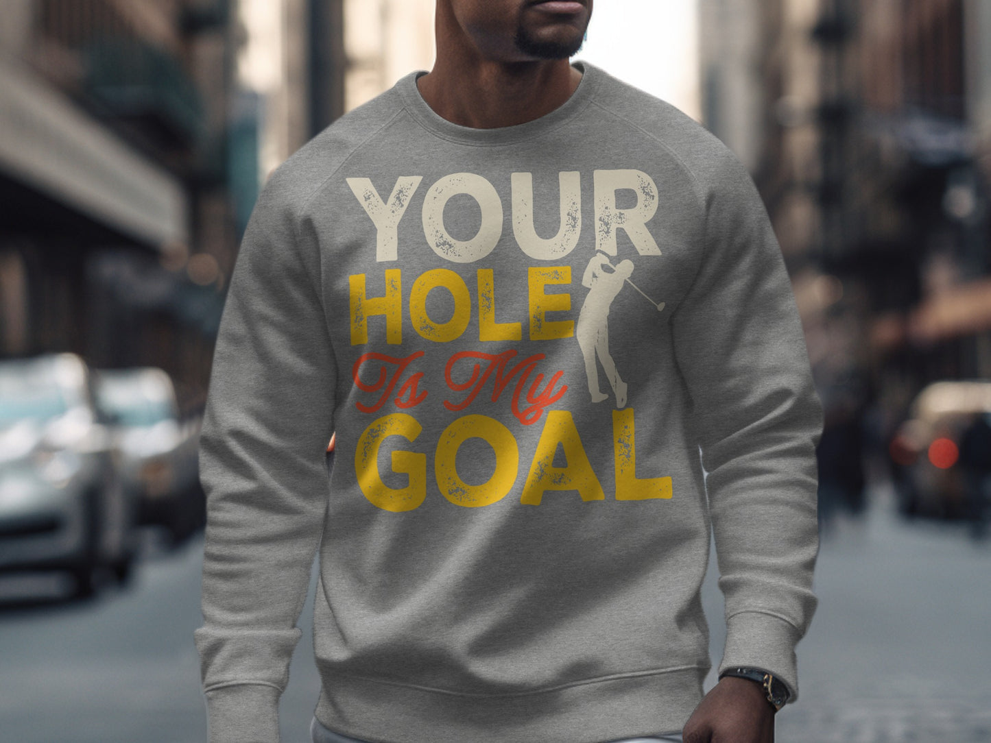 Grey sweatshirt with "Your Hole is My Goal" text and golfer graphic.