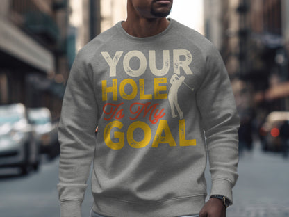 Grey sweatshirt with "Your Hole is My Goal" text and golfer graphic.