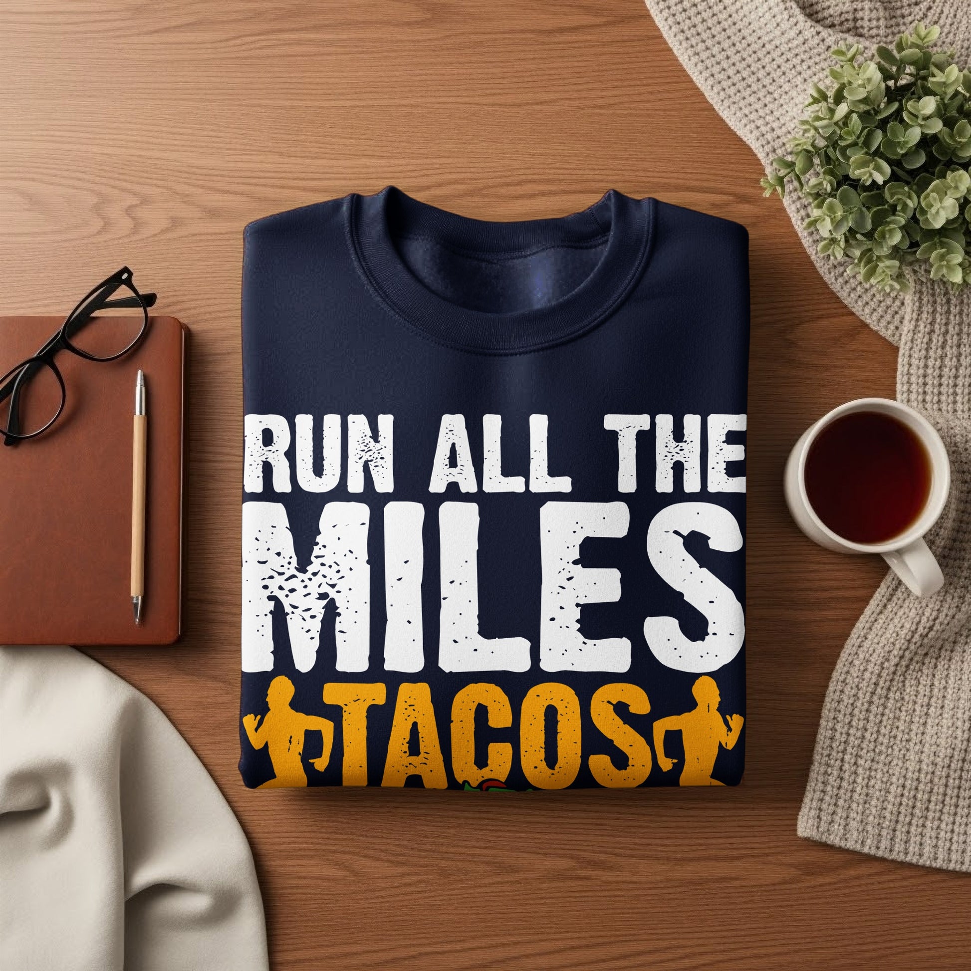 Navy sweatshirt with "Run All the Miles" and "Tacos" text.