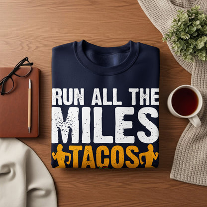 Navy sweatshirt with "Run All the Miles" and "Tacos" text.