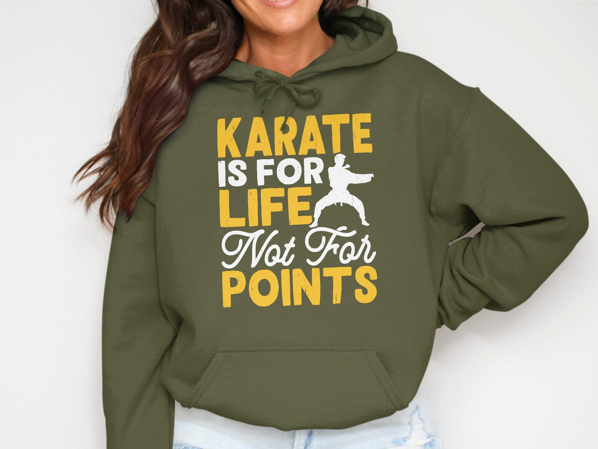 Green hoodie with "KARATE IS FOR LIFE Not For POINTS" and karate silhouette.
