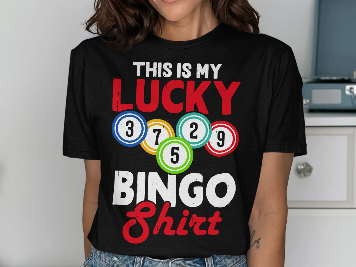 Black t-shirt with "THIS IS MY LUCKY BINGO Shirt" and colorful bingo balls.