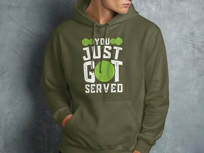 Green hooded sweatshirt with white text "YOU JUST GOT SERVED" and a tennis ball.