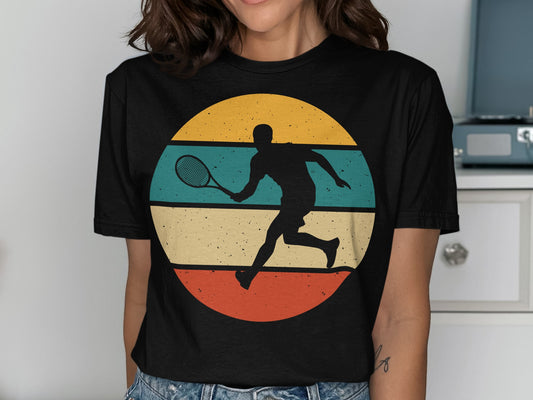 Black silhouette of a tennis player against a retro sunset circle graphic.