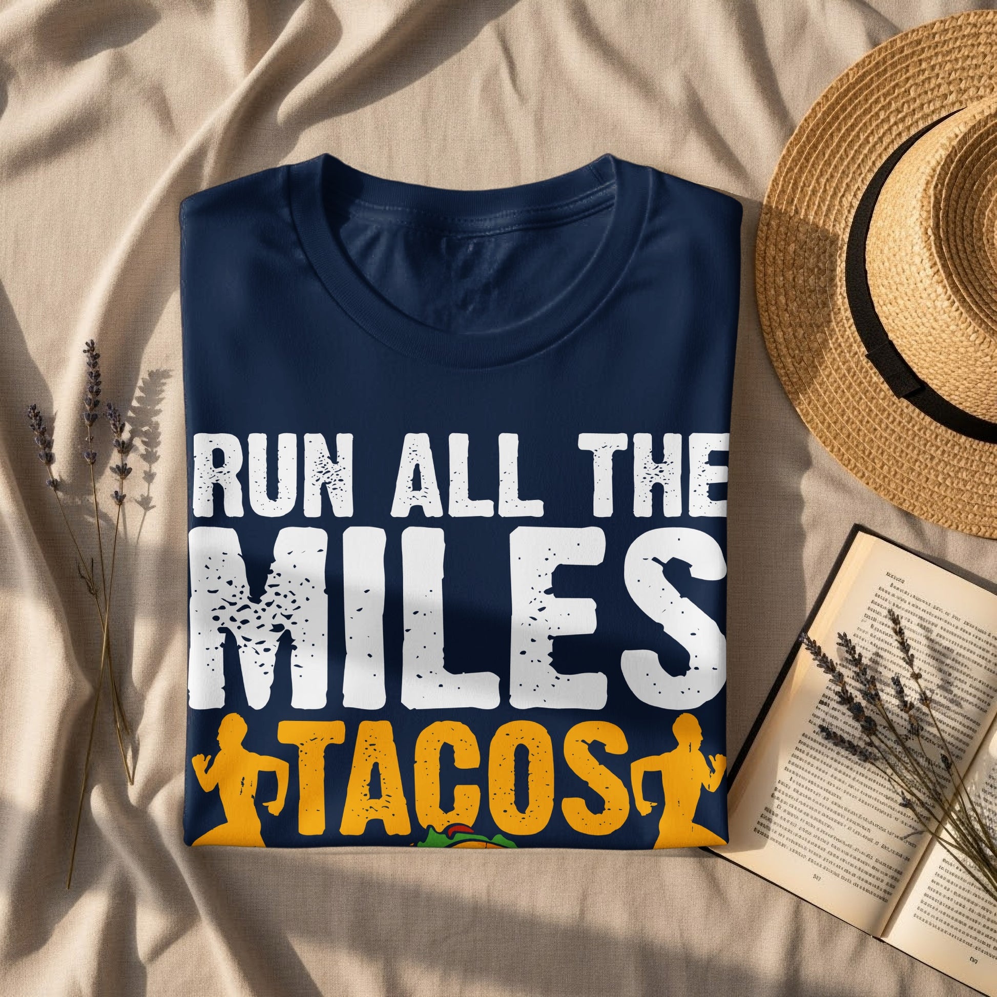 Navy t-shirt with "RUN ALL THE MILES TACOS" text and small taco graphic.