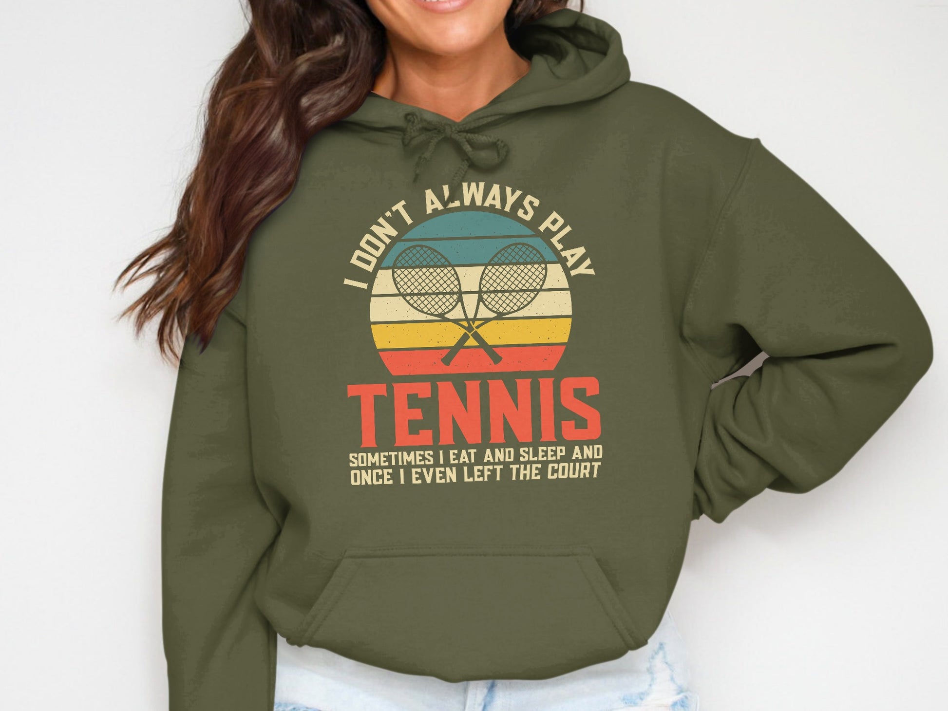 Olive green hoodie with "I Don't Always Play Tennis" slogan.