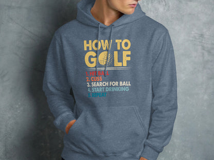 Blue hoodie with "How to Golf: 1. Cuss, 2. Search for Ball, 3. Start Drinking, 4. Repeat" text.