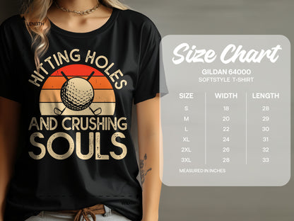 T-shirt with "Hitting Holes and Crushing Souls" text and golf ball graphic, with size chart.