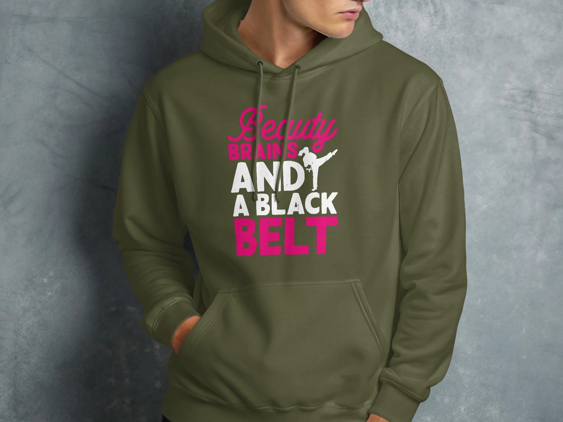 Olive green hoodie with "Beauty AND Brains A BLACK BELT" text.