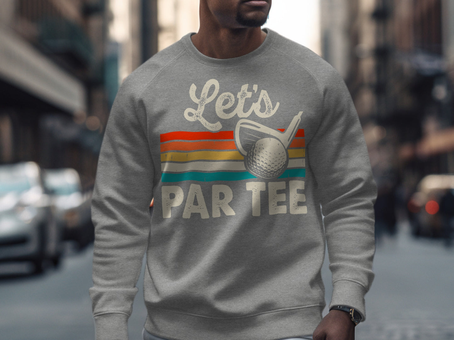 Gray sweatshirt with "Let's PAR TEE" and golf ball graphic.
