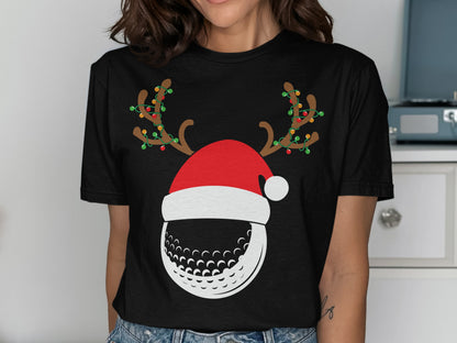 Black t-shirt with a graphic of a golf ball wearing a Santa hat and reindeer antlers.