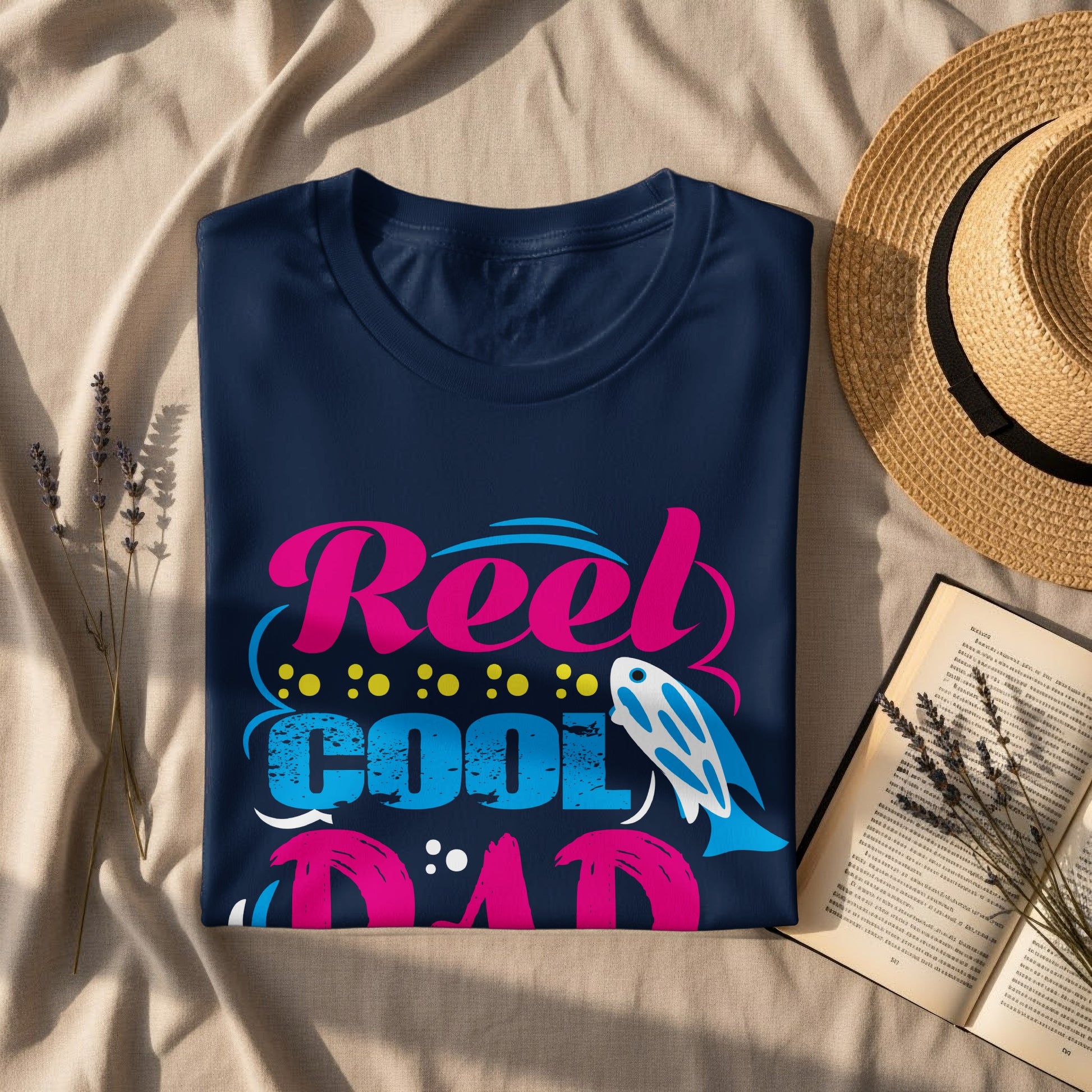 Navy t-shirt with "Reel Cool Dad" text and fish graphic.