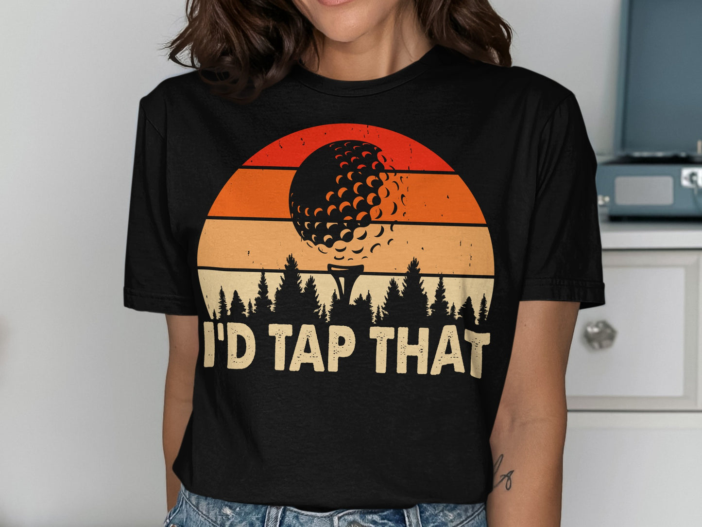 Black t-shirt with sunset graphic and "I'D TAP THAT" text.