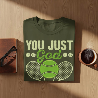 Green t-shirt with "You Just God" text and tennis ball graphic.