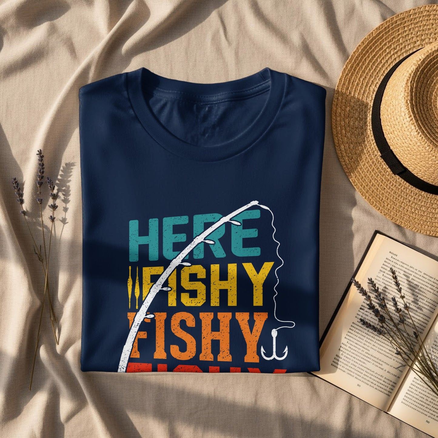 Navy blue t-shirt with "Here Fishy Fishy" text and fishing rod graphic.