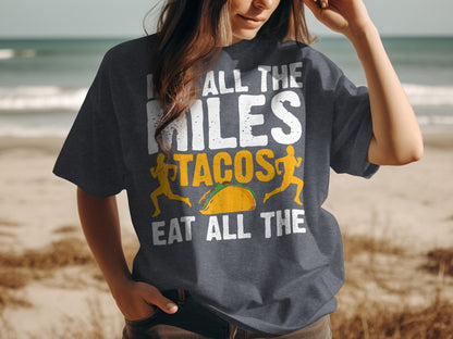 T-shirt with "I run all the miles, eat all the tacos" text and taco graphic.