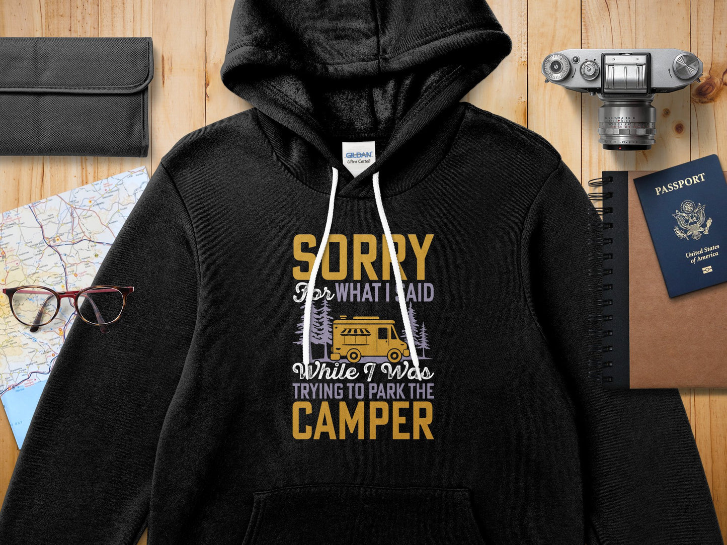 Black hoodie with "Sorry for what I said while I was trying to park the camper" text.