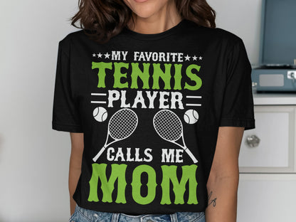 Black t-shirt with "My Favorite Tennis Player Calls Me Mom" and tennis graphics.
